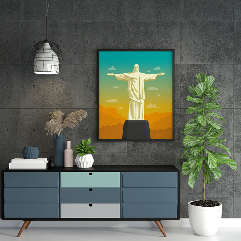 Quadro Decorativo Cristo Redentor Pendurado ao Lado de Planta Verde.