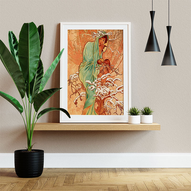 Quadro Decorativo Inverno Pendurado ao Lado de Planta Verde