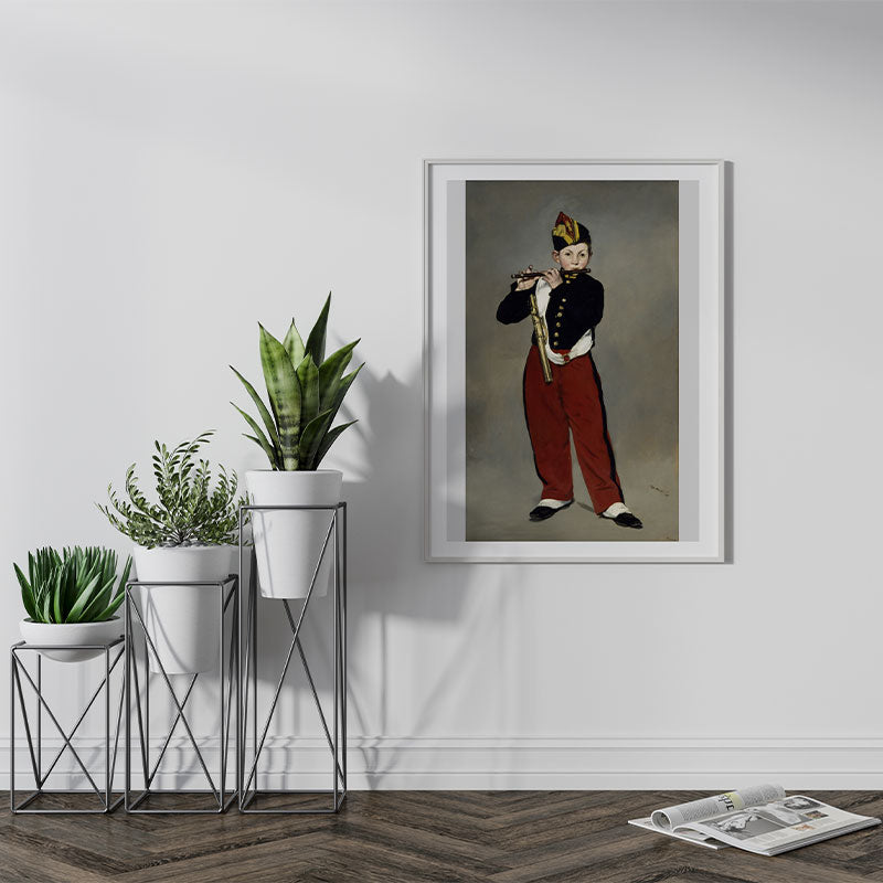 Quadro Decorativo O Tocador de Pífaro Pendurado ao Lado de Plantas Verdes.