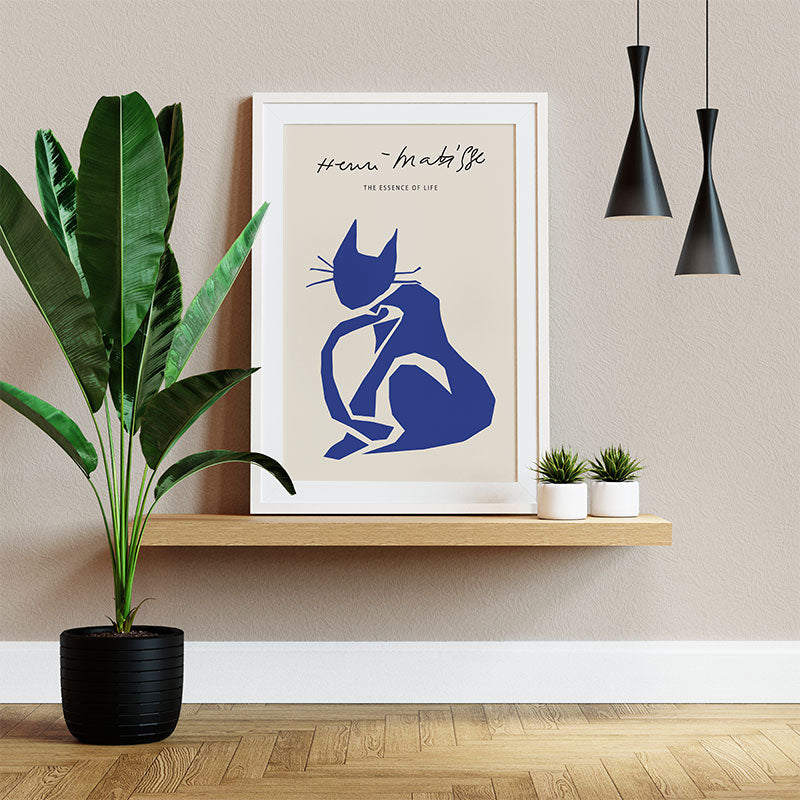 Quadro Gato Azul Matisse Pendurado Acima de Planta Verde.