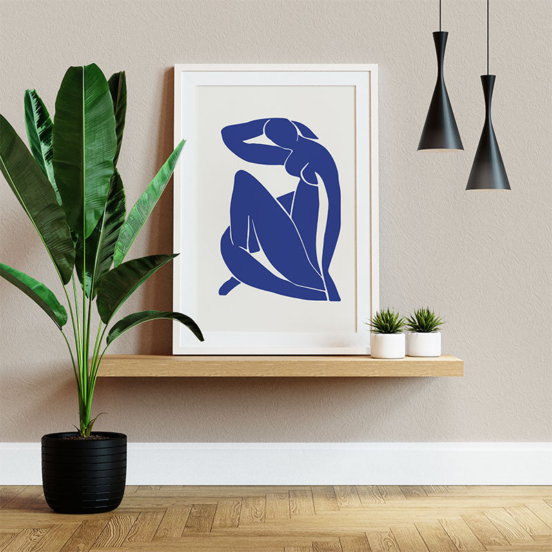 Quadro Decorativo de Henri Matisse Pendurado ao Lado de Planta Verde