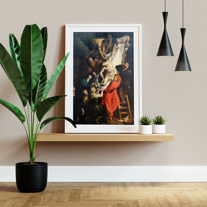 Quadro Decorativo A Descida da Cruz Pendurado ao Lado de Planta Verde.